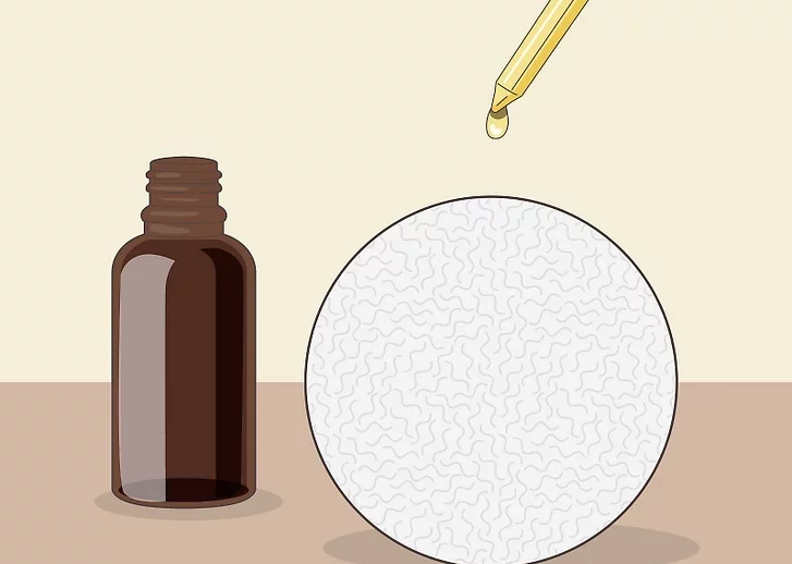 Bước 2: Thêm tinh dầu vào bóng sấy len nếu bạn muốn làm thơm quần áo