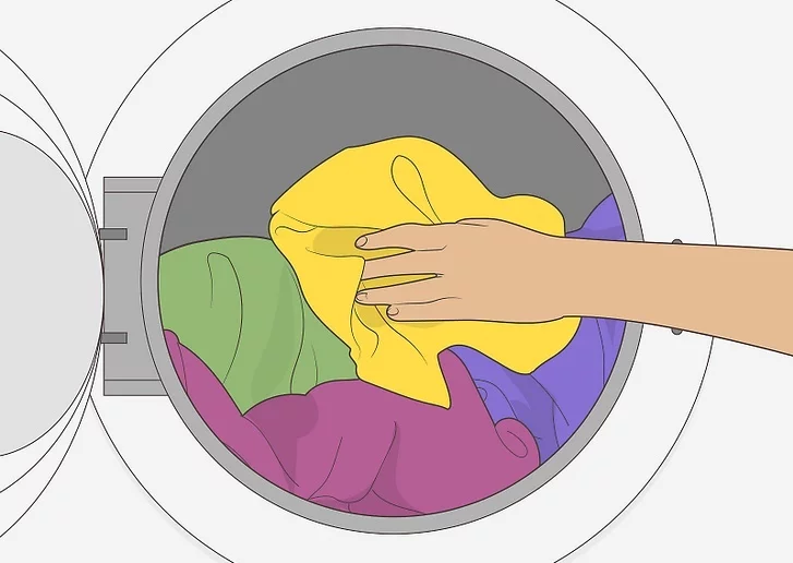 Bước 1: Bỏ quần áo ướt của bạn vào máy sấy